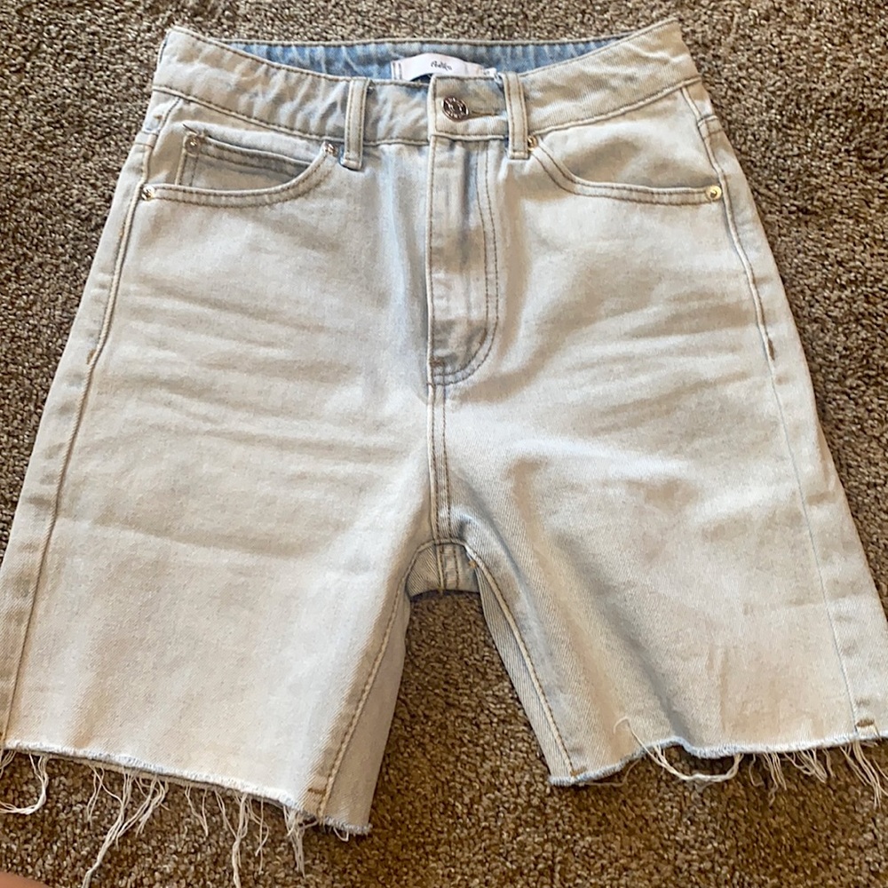 mid-thigh light denim shorts from ADIKA